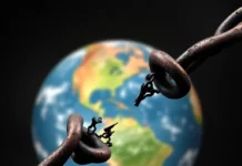 International Day for the Abolition of Slavery: A Global Call for Freedom An image of a broken chain, symbolizing the end of slavery, with a globe in the background