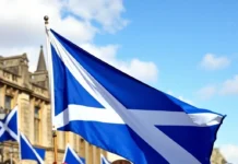 Saint Andrew’s Day: Celebrating Scotland’s Patron Saint Scottish flag Saltire flying high, with people in traditional Scottish attire celebrating Saint Andrew’s Day