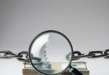 International Anti-Corruption Day: Combating Corruption for a Better Future magnifying glass over a stack of money, symbolizing transparency