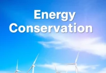 National Energy Conservation Day – Promoting Sustainable Energy for a Better Future solar panels and wind turbines, with a clear blue sky