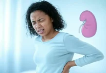 World Kidney Day: Understanding the Importance of Kidney Health a person holding their lower back in a posture indicating kidney pain - World Kidney Day
