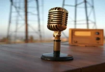 National Broadcasting Day India (July 23rd) microphone and a radio tower symbolizing the history of radio broadcasting in India