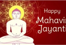 Mahavir Jayanti 2025: Significance, Celebrations & Date An idol of Lord Mahavir adorned with flowers and traditional decorations during a temple celebration