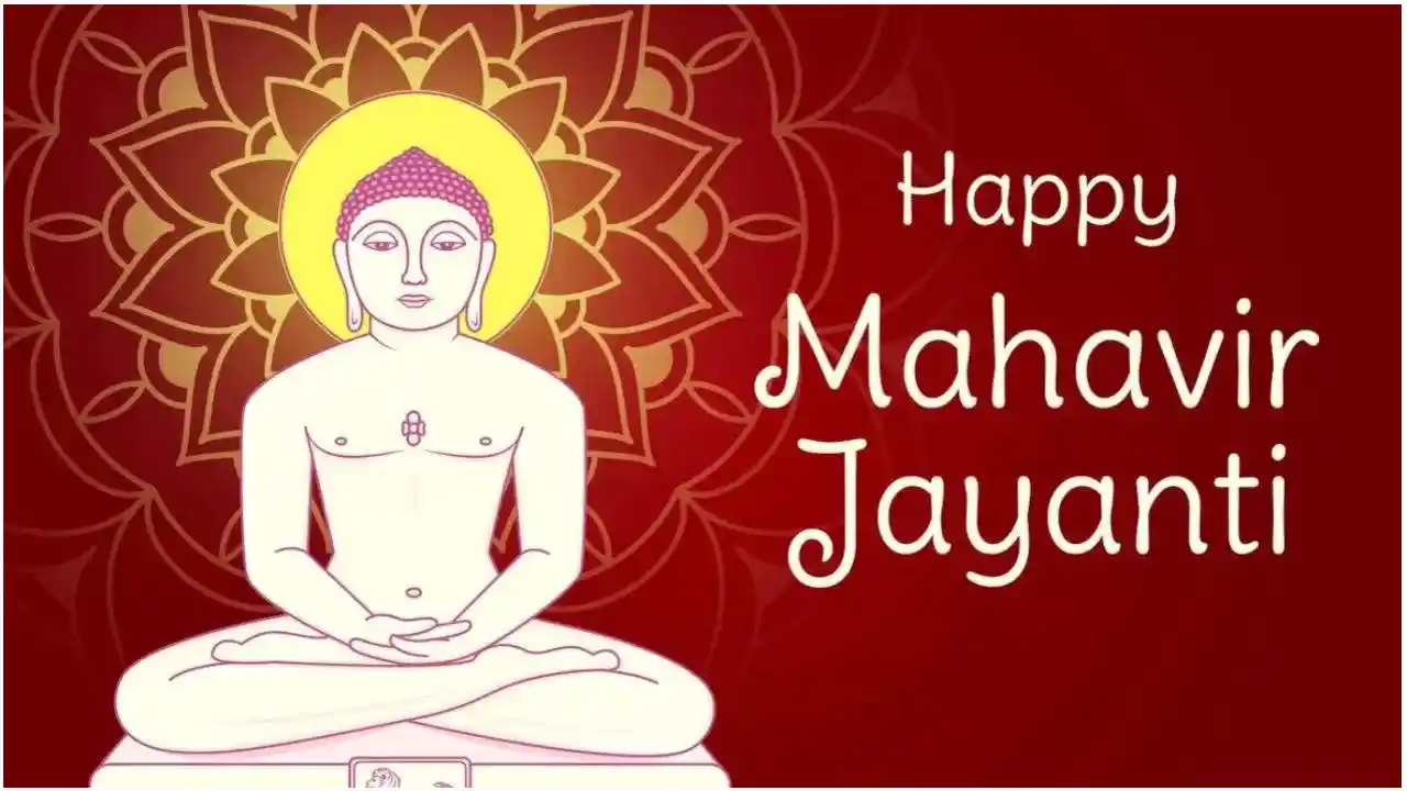 An idol of Lord Mahavir adorned with flowers and traditional decorations during a temple celebration An idol of Lord Mahavir adorned with flowers and traditional decorations during a temple celebration