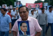 Ambedkar Jayanti: Honoring the Architect of the Indian Constitution Participants marching in a rally holding portraits of Dr. Ambedkar and banners promoting social justice