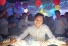 Don’t Go to Work Unless It’s Fun Day (April 3rd) Smiling employee with party ON Don't Go to Work Unless It's Fun Day