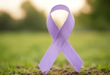 World Lupus Day: Raising Awareness for a Silent Struggle A purple ribbon symbolizing lupus awareness, on "World Lupus Day – May 10